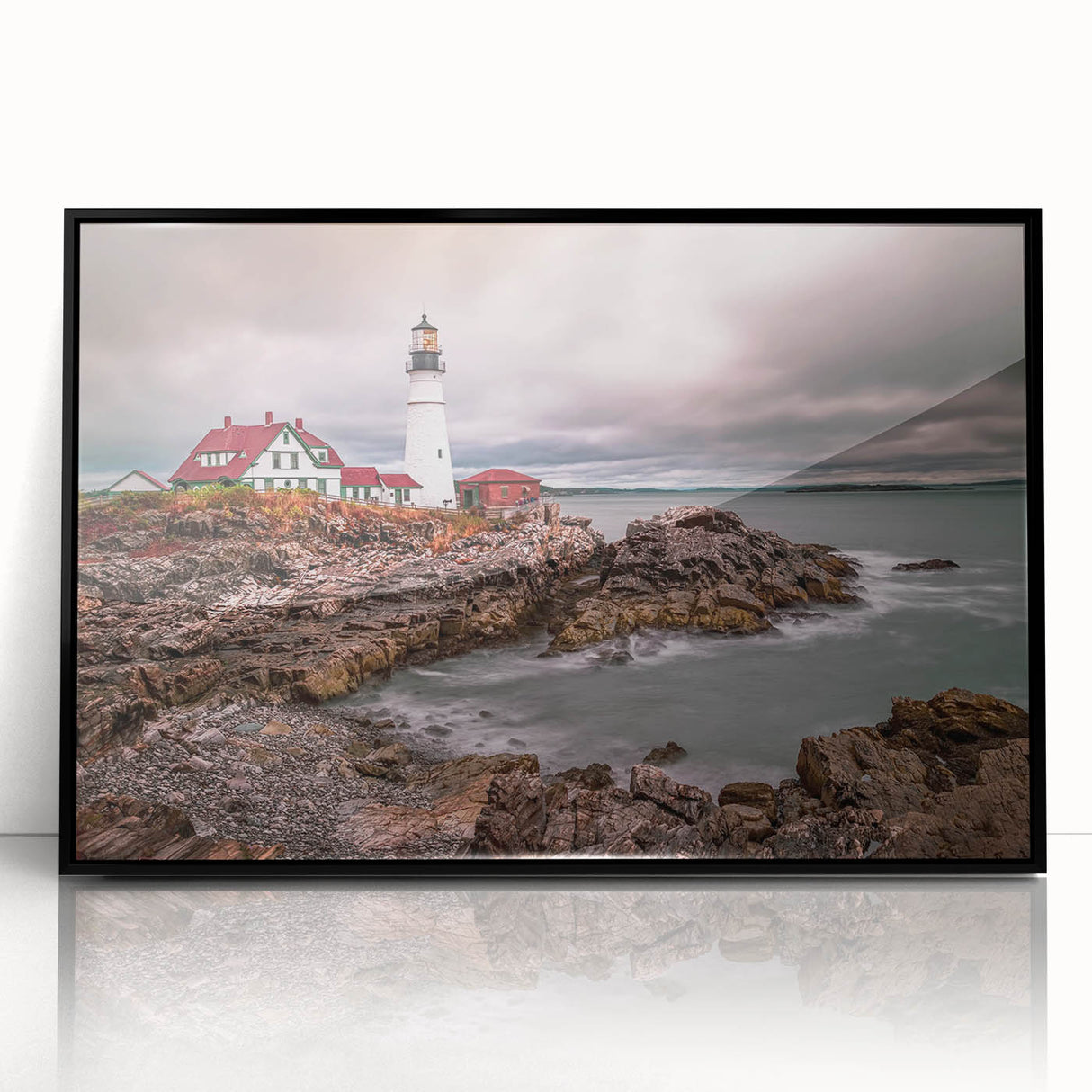 Large abstract wall art depicting Portland's scenery in muted gray and blue, acrylic print in black frame.