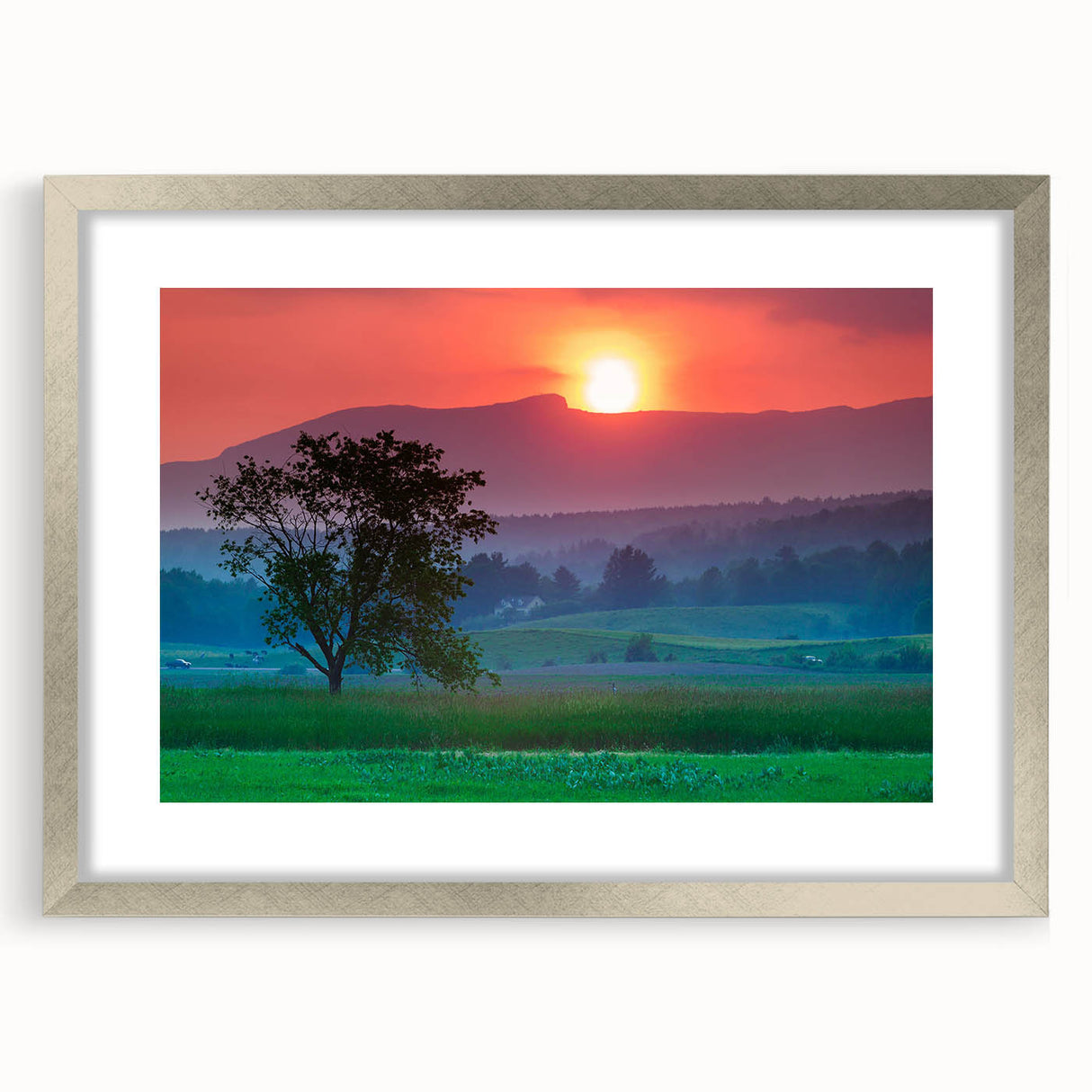 Textured art print of abstract Vermont scenery in muted earth tones, framed in silver, ideal for bedroom wall decor.