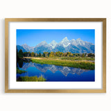 Extra large wall art of Grand Tetons scenery in muted earth tones on a textured canvas, framed in gold.