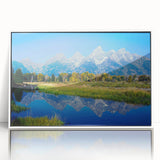 Framed acrylic print of the Grand Tetons with soft blue and green hues, ideal for modern nursery wall art.