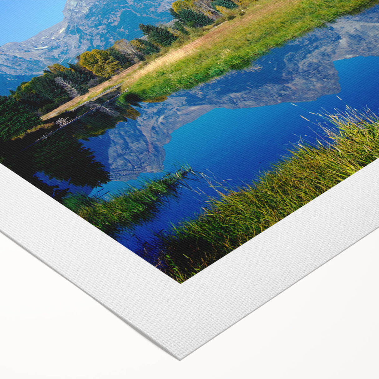 Art deco poster of Grand Tetons with muted earth tones on rolled canvas, suitable for dining room decor.