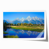 Rolled print of the Grand Tetons in Wyoming, featuring muted green and blue tones, ideal for art wall dining room.