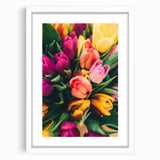 Abstract art print featuring swirls of green and yellow tones on a white framed canvas, ideal for dining room decor.