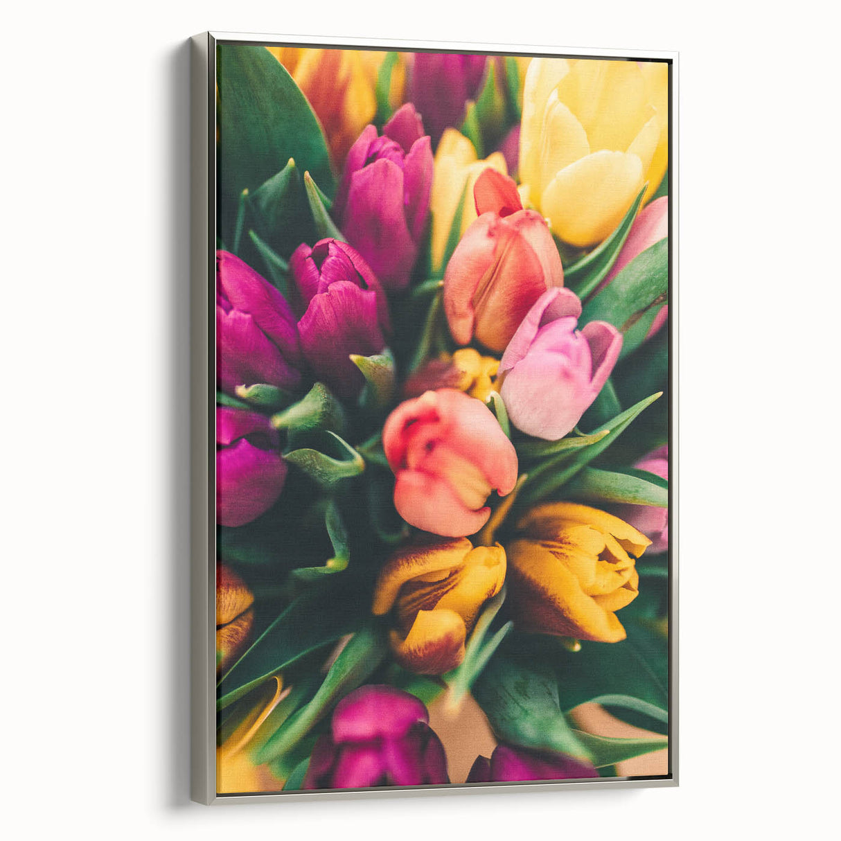 Framed canvas featuring a vintage-style landscape art painting of spring, with vibrant green and floral hues.