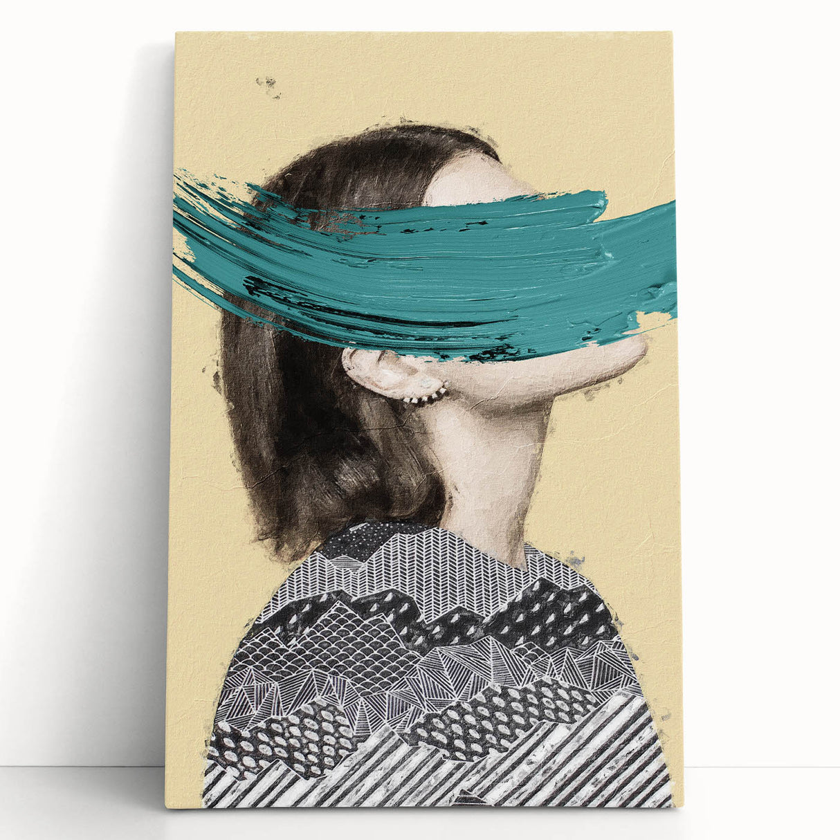 Abstract figurative canvas art showcasing vibrant colors and dynamic shapes, elegantly leaning against a neutral wall, perfect for modern home decor.