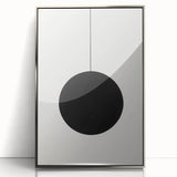 Framed abstract minimalist wall art with a sleek silver frame, showcasing a modern design that complements contemporary decor, perfect for enhancing living spaces.