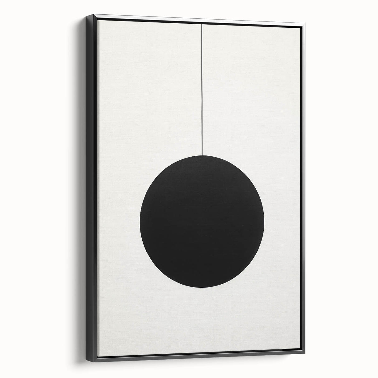 Framed minimalist wall art featuring an abstract design in black, displayed from a side view against a neutral background, ideal for modern decor.