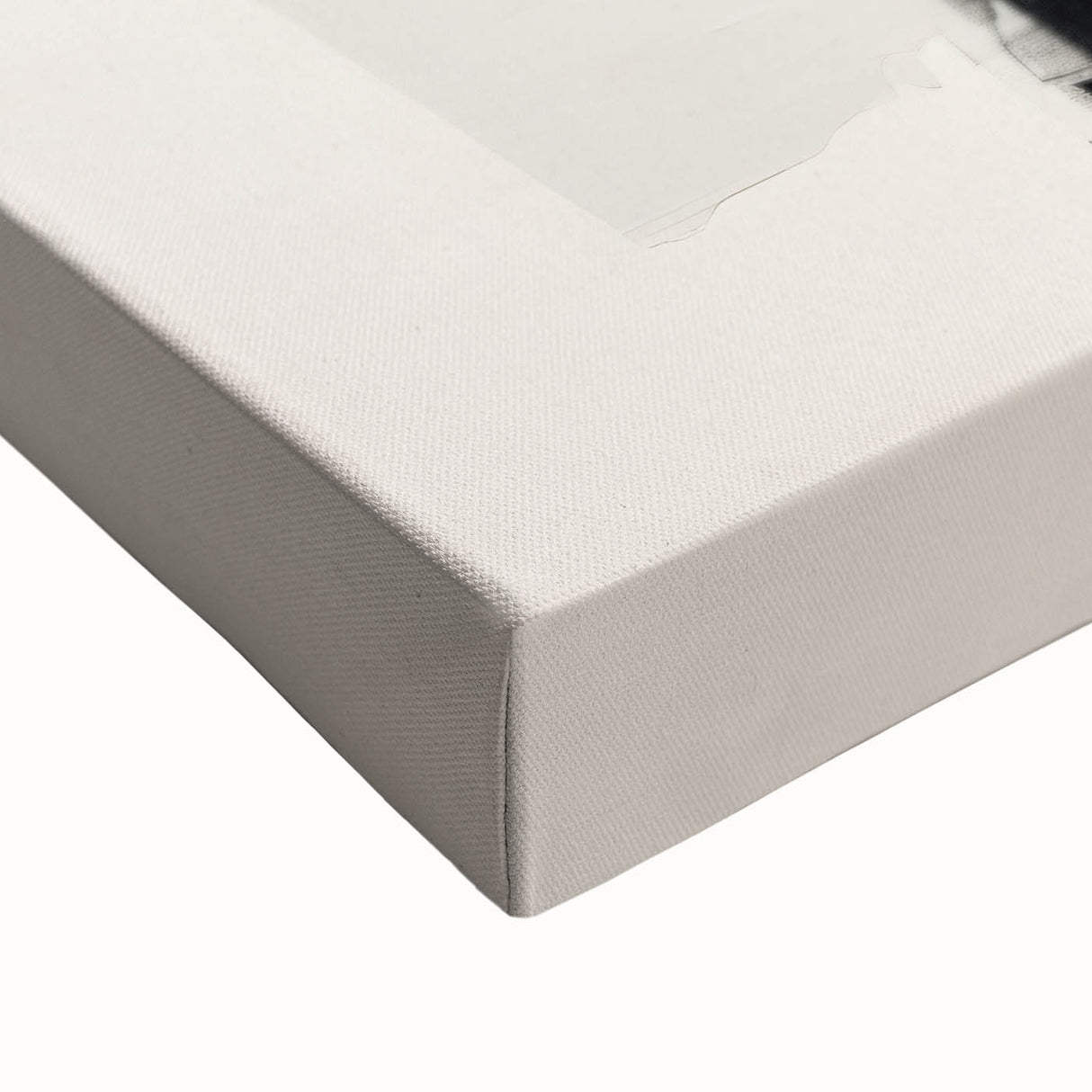 Close-up of abstract minimalist wall art on stretched canvas, showcasing soft pastel colors and geometric shapes, perfect for modern home decor.