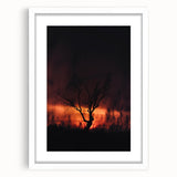Abstract art print depicting autumnal colors on a white framed canvas, suitable for bedroom or dining room decor.
