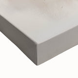 Close-up of an abstract minimalist wall art design on stretched canvas, showcasing soft pastel colors and geometric shapes, perfect for modern home decor.