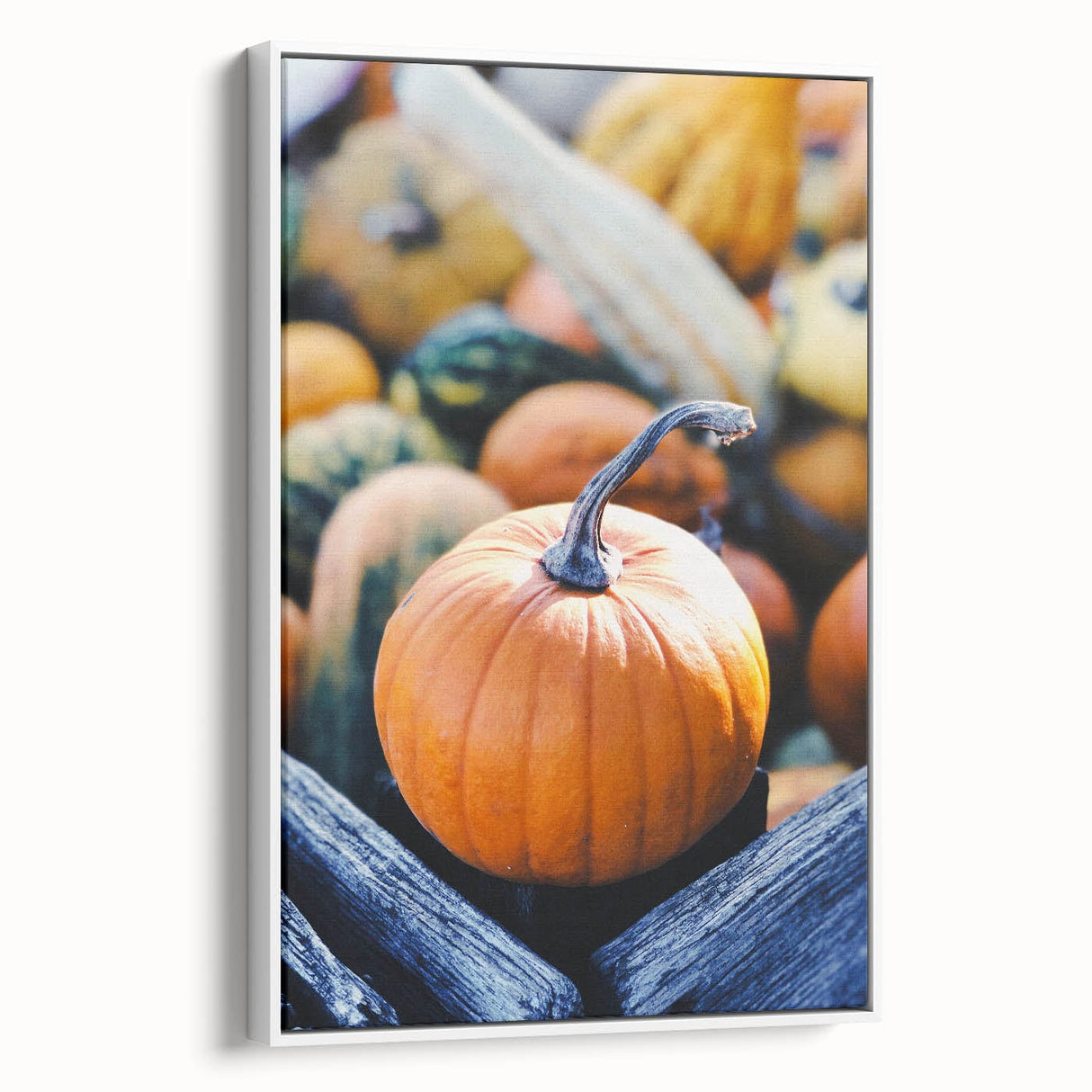 Vintage poster art of autumn leaves in vibrant orange and red tones on a large framed canvas, suitable for living room decor.