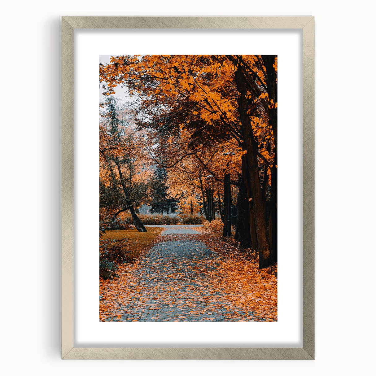 Textured abstract art print in warm autumnal hues on a framed silver mat, suitable for bedroom decor.