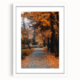 Abstract art print featuring autumnal hues in a white frame, suitable for dining room or bedroom decor.