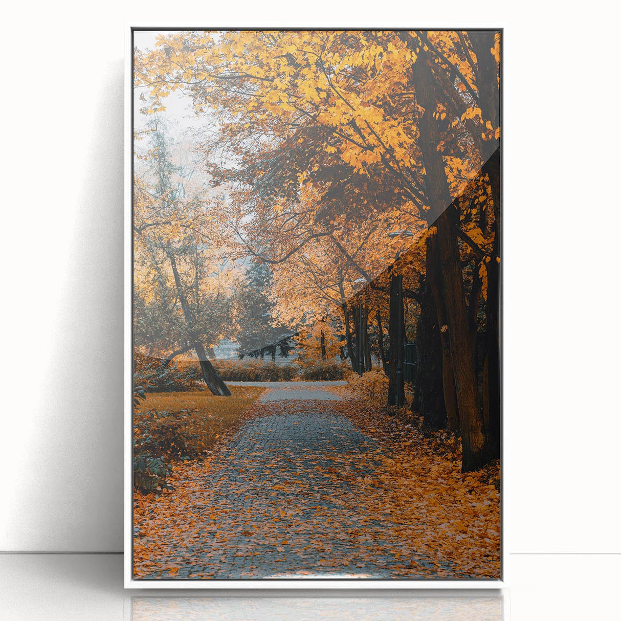 Art deco poster depicting a stylized fall scene with warm orange and brown tones on a white acrylic framed print.