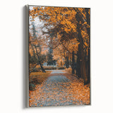 Framed canvas featuring a vintage-style landscape painting of autumn trees with colorful foliage against a black background.