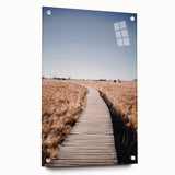 Large abstract wall art depicting a fall scene in orange and brown tones on acrylic glass.