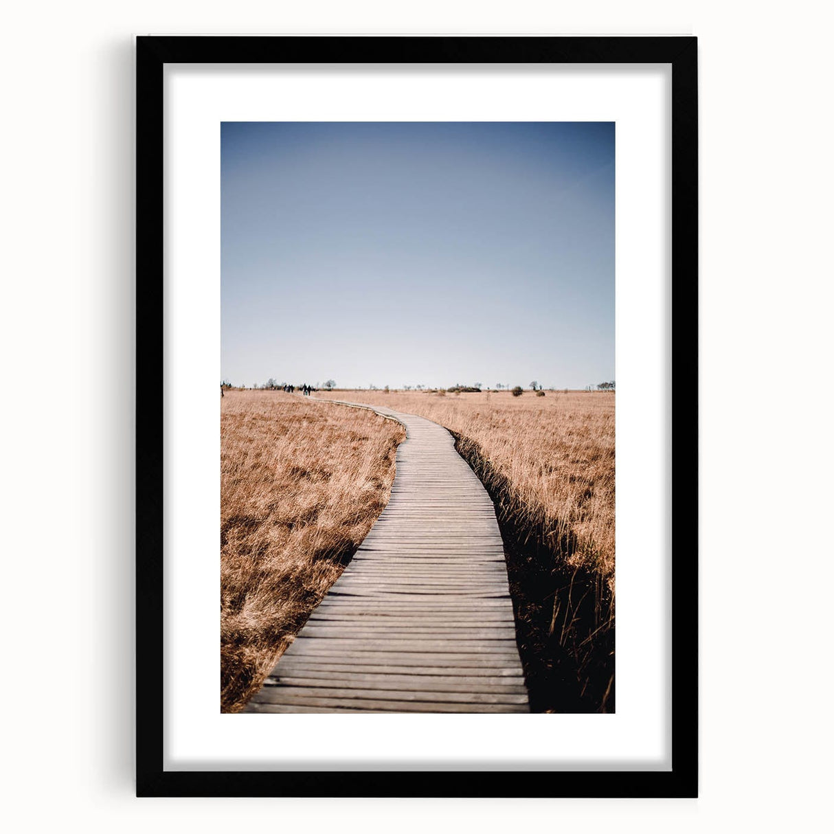 Extra large abstract art print featuring textured, colorful foliage, in a black frame, ideal for living room decor.