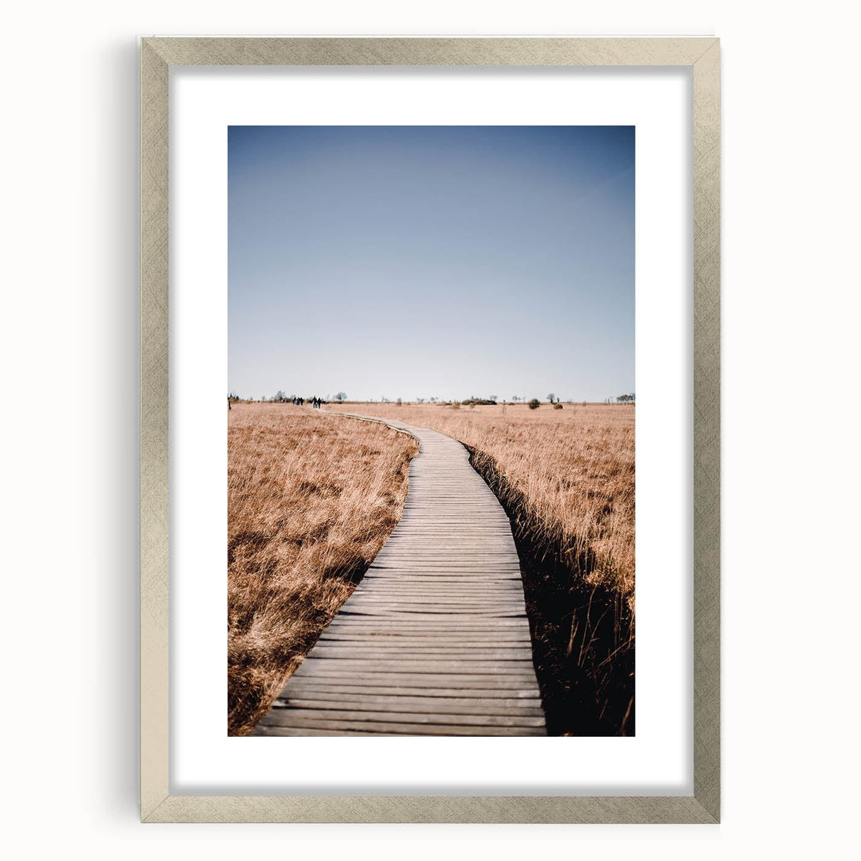 Textured abstract art print depicting autumn colors in orange and brown on a silver-framed canvas.
