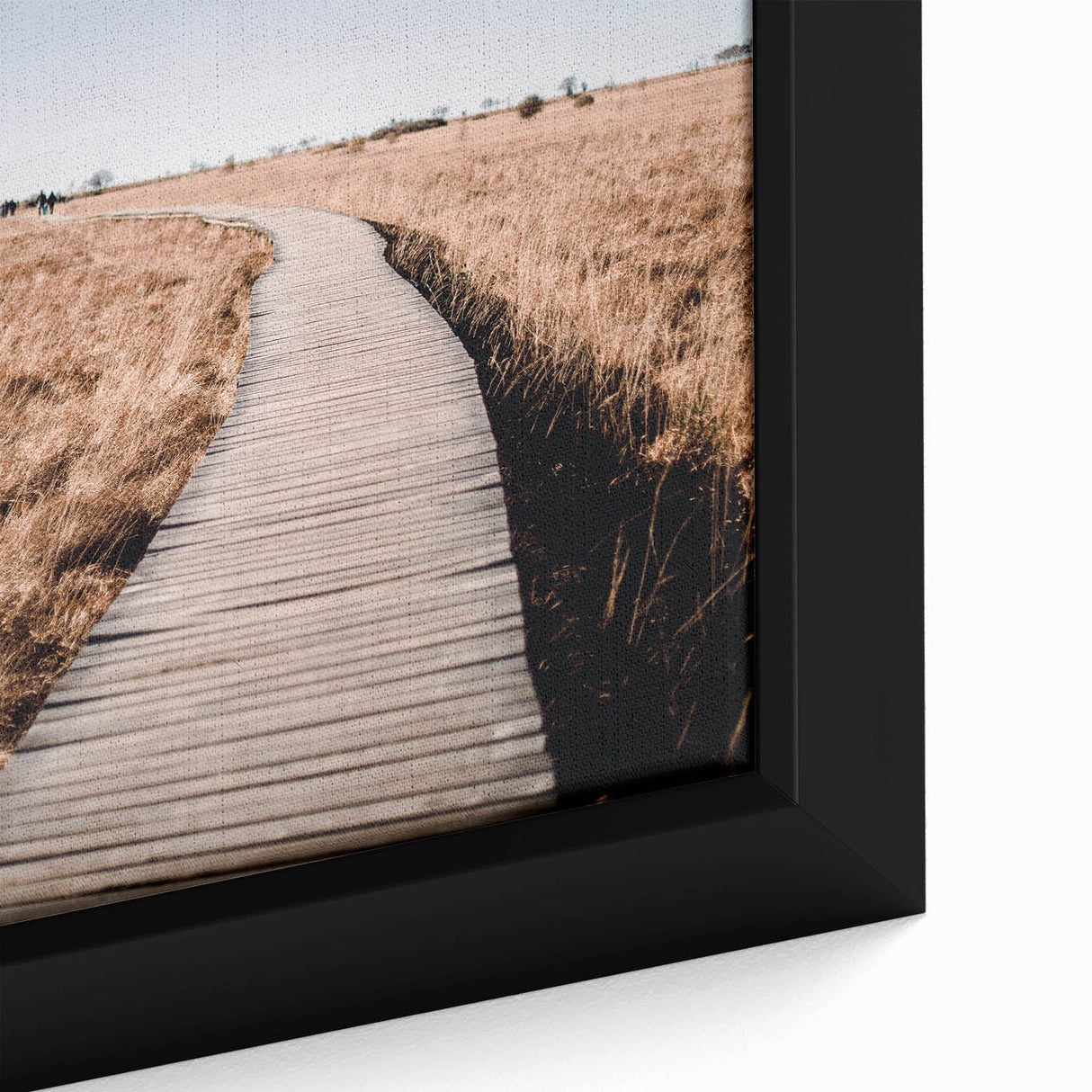 Close-up of extra large black wall art featuring a textured, colorful abstract design on framed canvas.