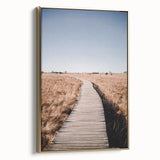 Framed canvas depicting a vintage landscape painting of autumn trees in golden hues, ideal for bedroom wall decor.