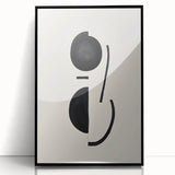 Framed abstract minimalist wall art with a sleek black acrylic front, showcasing a contemporary design ideal for modern home decor. Perfect for adding elegance to living spaces.