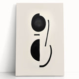 Abstract minimalist wall art on stretched canvas, featuring soft earth tones and geometric shapes, leaning against a neutral wall, perfect for modern home decor.