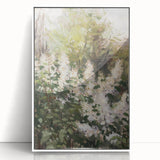 Framed acrylic artwork showcasing an abstract floral design in vibrant colors, featuring a sleek white frame, perfect for modern home decor.