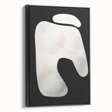 Framed minimalist wall art featuring an abstract black design on canvas, showcasing a sleek side view. Ideal for modern home decor, enhancing aesthetic sophistication.