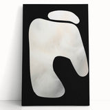 Abstract minimalist wall art print on stretched canvas, featuring soft earth tones and geometric shapes, elegantly leaning against a neutral wall, perfect for modern decor.
