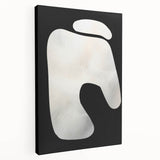Abstract minimalist wall art design on stretched canvas showcasing bold shapes and muted colors, viewed from the side to highlight its depth and texture. Perfect for modern home decor.