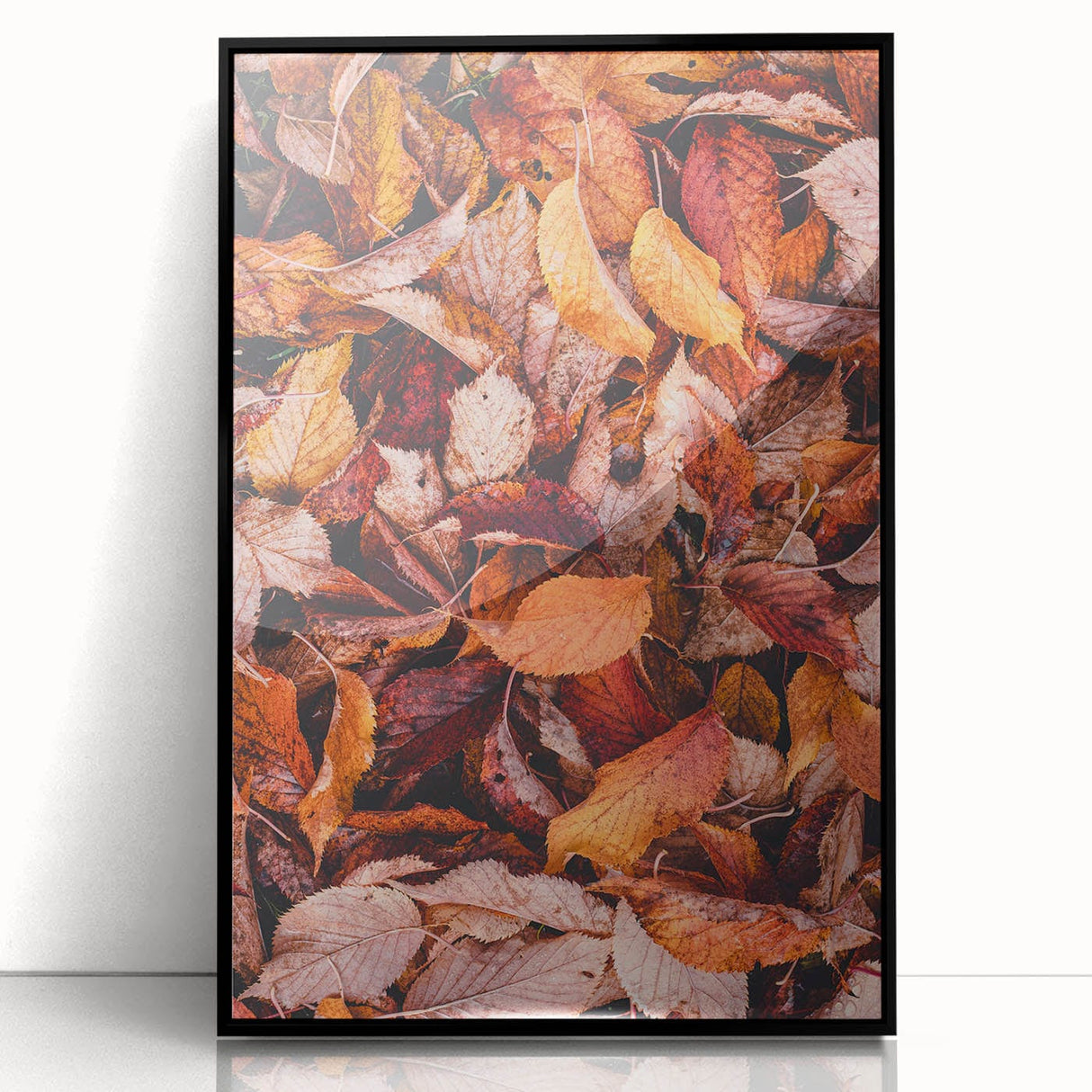 Large abstract wall art depicting fall colors in mid-century modernist style on a black framed acrylic print.