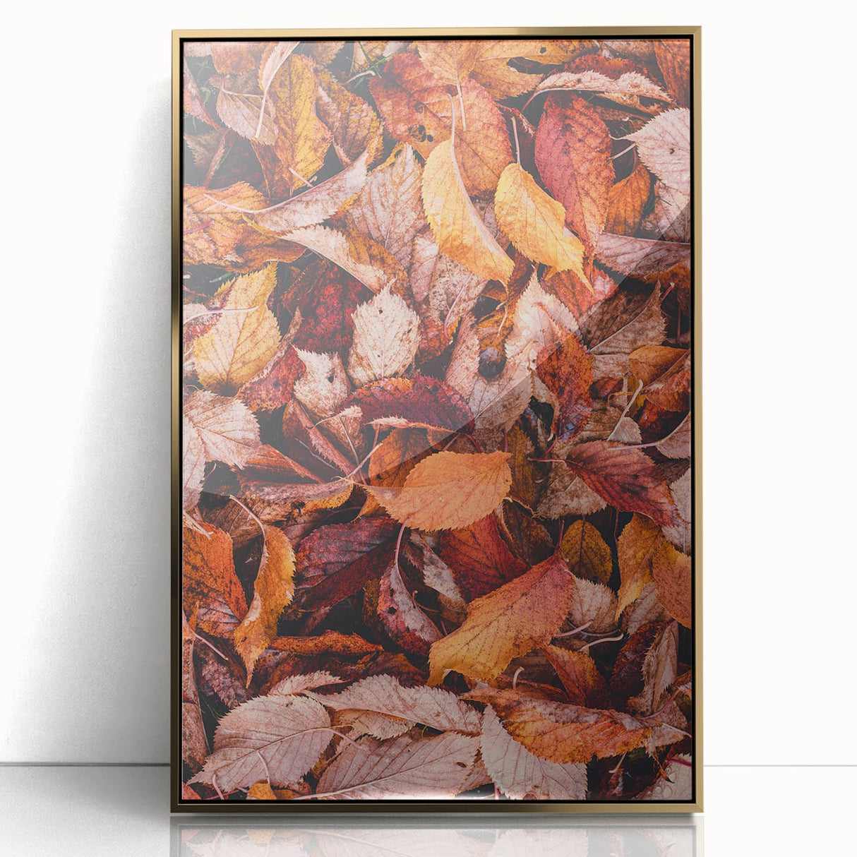 Mid-century modernist art depicting autumn trees, in gold and orange tones on a framed acrylic.