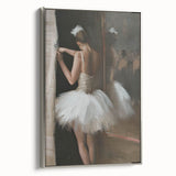 Framed abstract figurative canvas art showcasing dynamic shapes in silver tones, presented in a stylish frame, ideal for modern home decor accents.