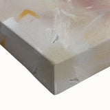 Close-up of a vibrant abstract floral stretched canvas artwork showcasing bold colors like teal, pink, and gold, ideal for modern home decor enhancement.