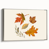 Framed canvas featuring a vintage landscape painting of autumn trees in vibrant orange and red tones.