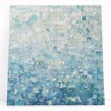 Abstract splatter art canvas featuring vibrant colors, ideal for modern home decor. The artwork leans against a neutral wall, enhancing contemporary aesthetics.