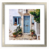 Textured abstract art print depicting a Greek door in muted earth tones, framed in silver, ideal for bedroom art.