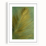 Framed wall art featuring a vibrant floral design with green leaves, presented in a white mat, enhancing home decor aesthetics. Ideal for nature-inspired interiors.