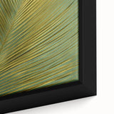 Close-up of a framed canvas wall art featuring vibrant floral and botanical designs, showcasing intricate details and rich colors perfect for home decor.