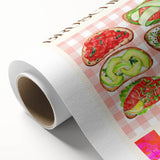 Art deco poster featuring an array of stylized food dishes in bold colors on rolled canvas.