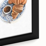 Close-up of black wall art featuring colorful, textured pastries on a framed canvas, ideal for a spacious living room.