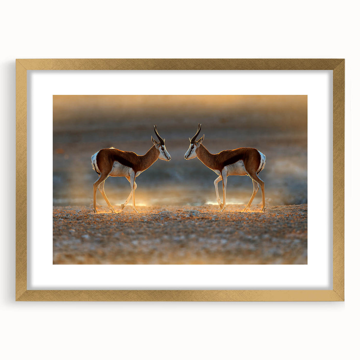 Textured abstract art print depicting a muted gold and beige African landscape on a framed canvas, suitable for bedroom art.