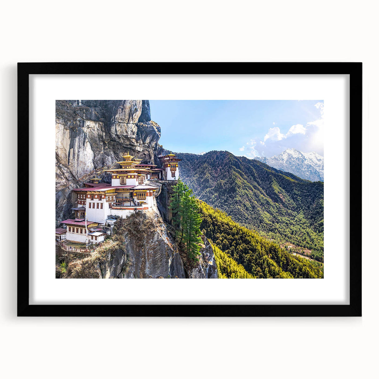Extra large, colorful abstract art print of a Tibetan landscape in vibrant hues on a textured canvas, framed in black.