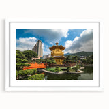 Abstract art print of Hong Kong skyline in muted gray and blue tones, framed with a white mat.