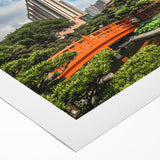 Art deco poster featuring the Hong Kong skyline in muted gold and black tones on rolled canvas.