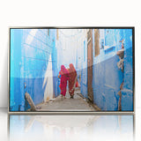 Mid-century modernist art depicting a serene Indian landscape in muted earth tones on a silver-framed acrylic print.