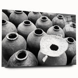 Large abstract wall art of a Laos scenery in muted green and blue tones on acrylic glass.