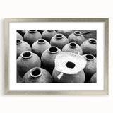 Textured abstract art print depicting a Laos scenery in muted earth tones on a framed silver mat, ideal for bedroom art.