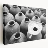 Large art depicting a serene Laotian landscape on stretched canvas, in soft green and blue tones.