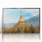 Mid-century modernist art depicting a Myanmar landscape in muted earth tones on a silver-framed acrylic print.